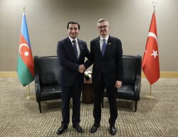 Hikmət Hacıyev Antalya Forumunda Burhanəddin Duranla görüşüb