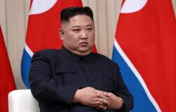 Kim Çen In yeni açılan körpü ilə Çinə səfər edib