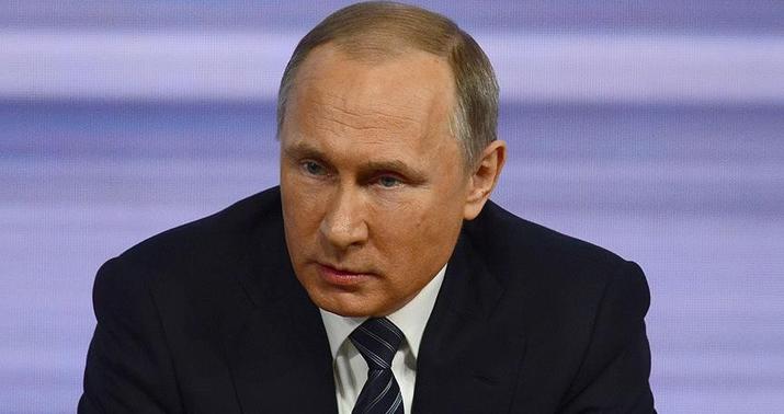 Putinin yaxın dostunun adı vergi qalmaqalında