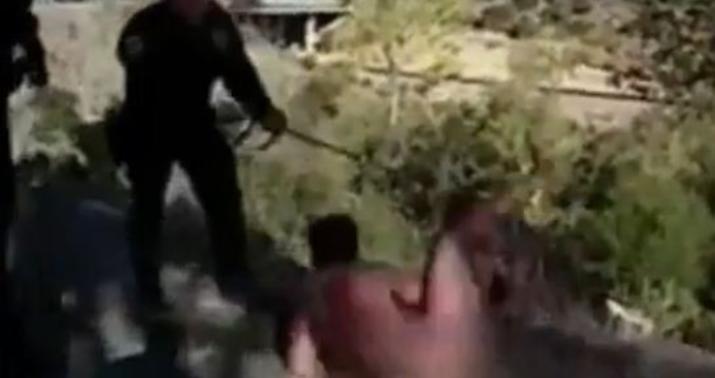Polis iti saxlanılan şəxsin üstünə buraxdı  - VİDEO/18+